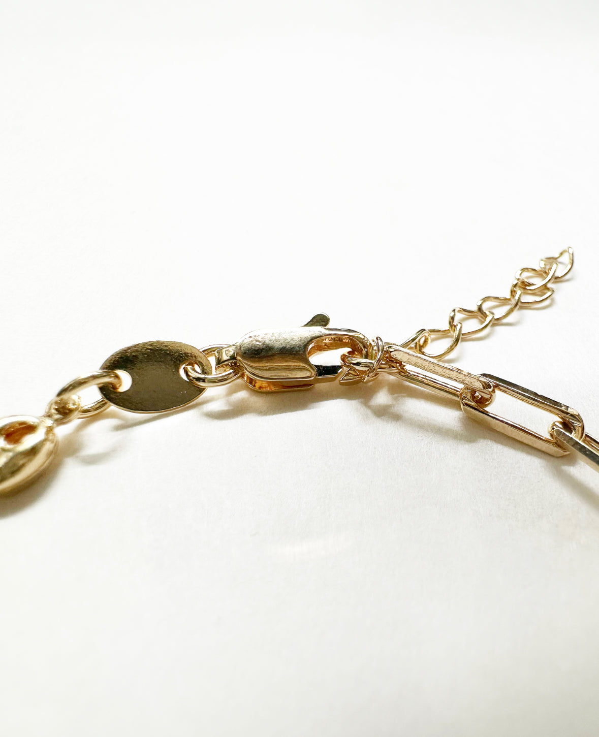 Close-up view of the lobster clasp on our Glow Bracelet.