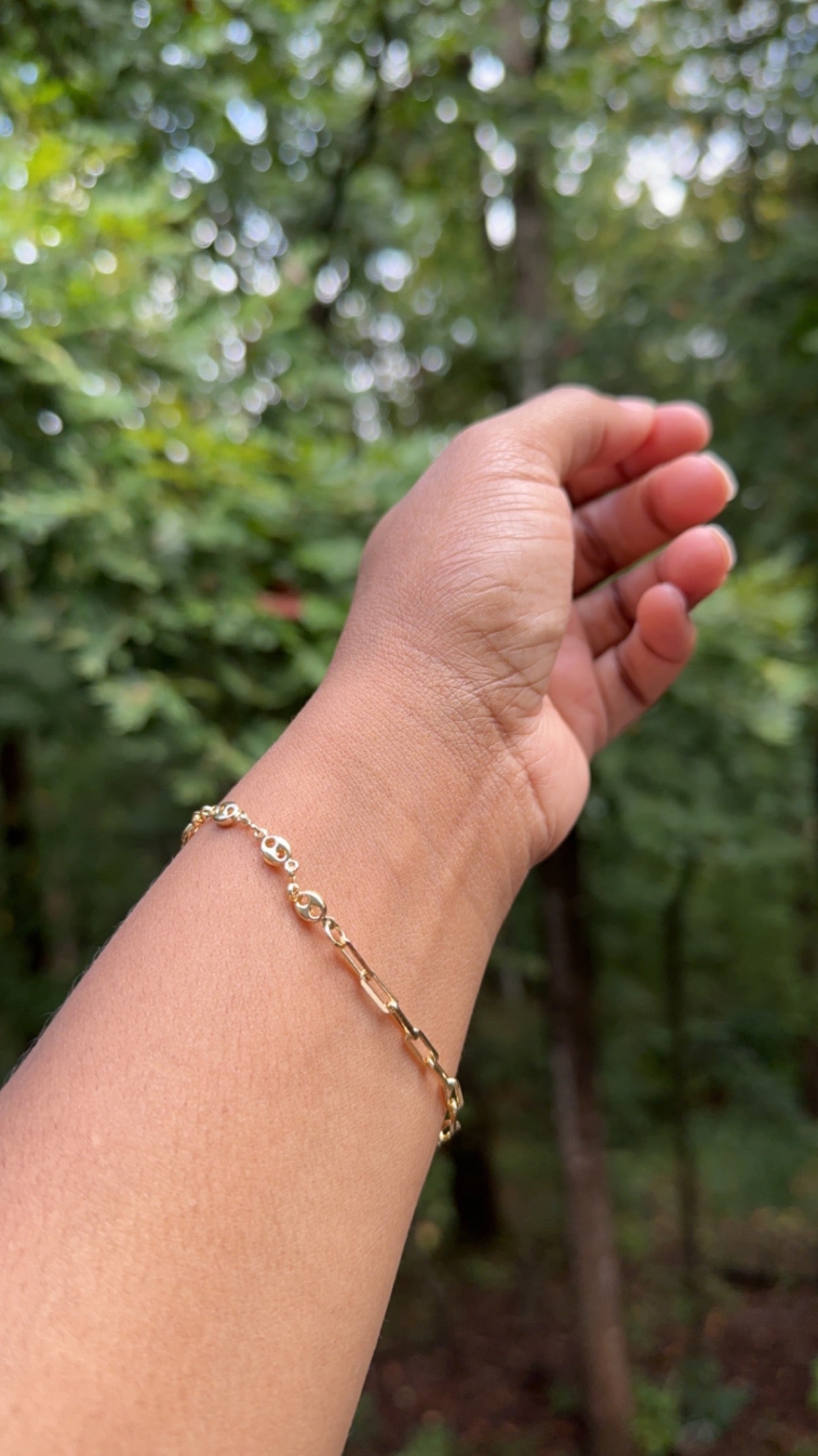 Glow Bracelet shown on model's wrist.
