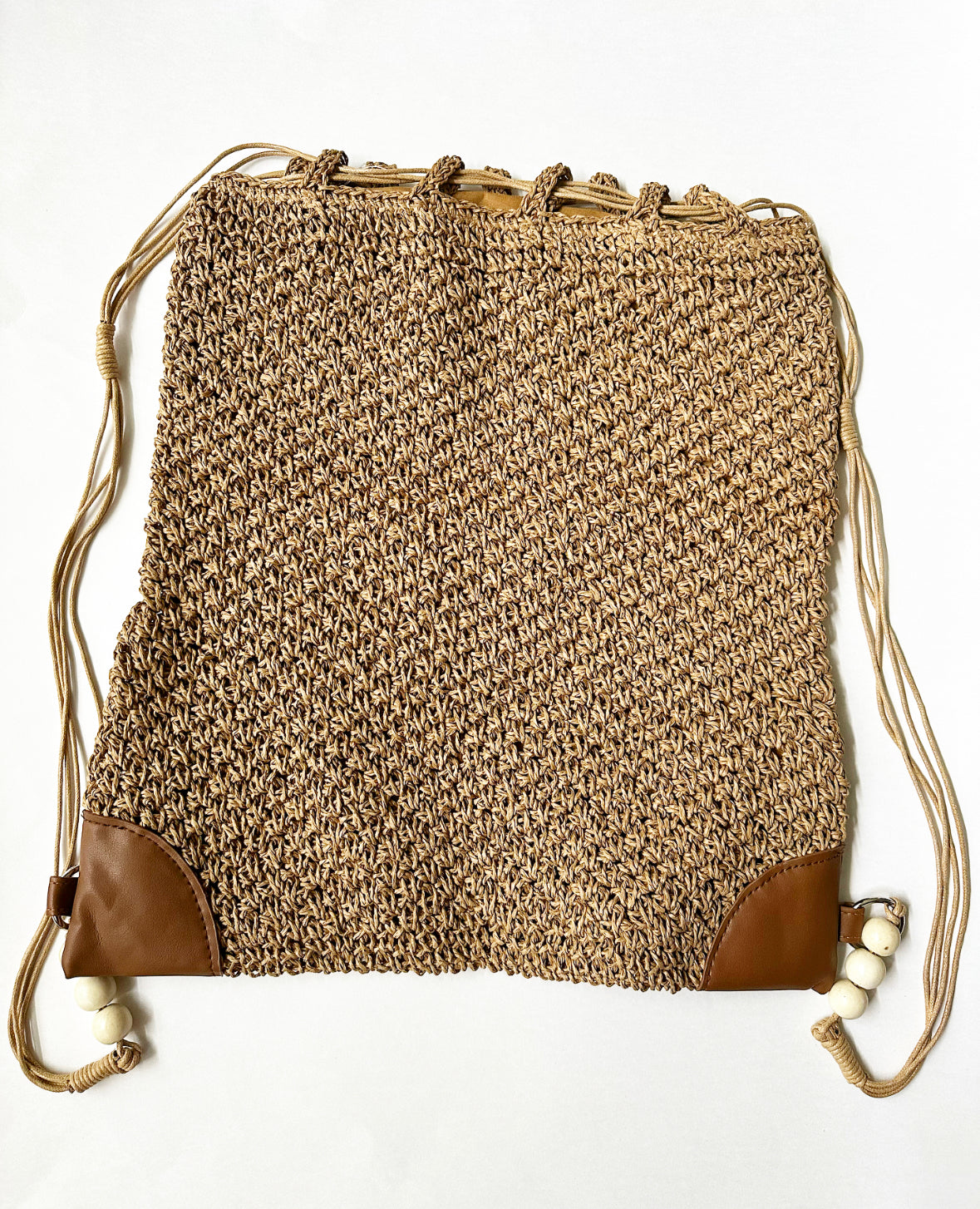 Flattened Nite & Day Drawstring Bag in Tan.