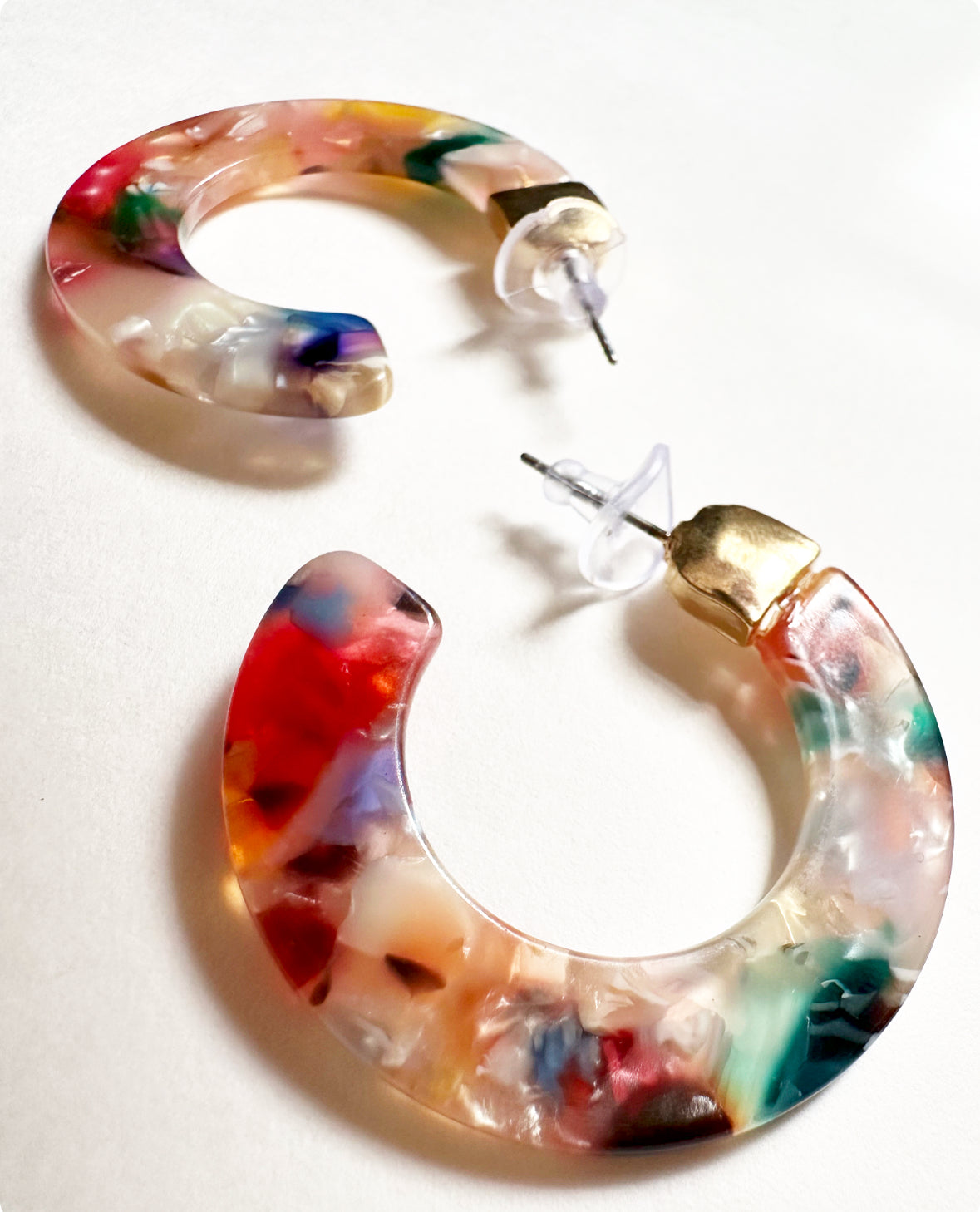 Close-up detailed view of our Leilani Hoops in Tropicana Pink.