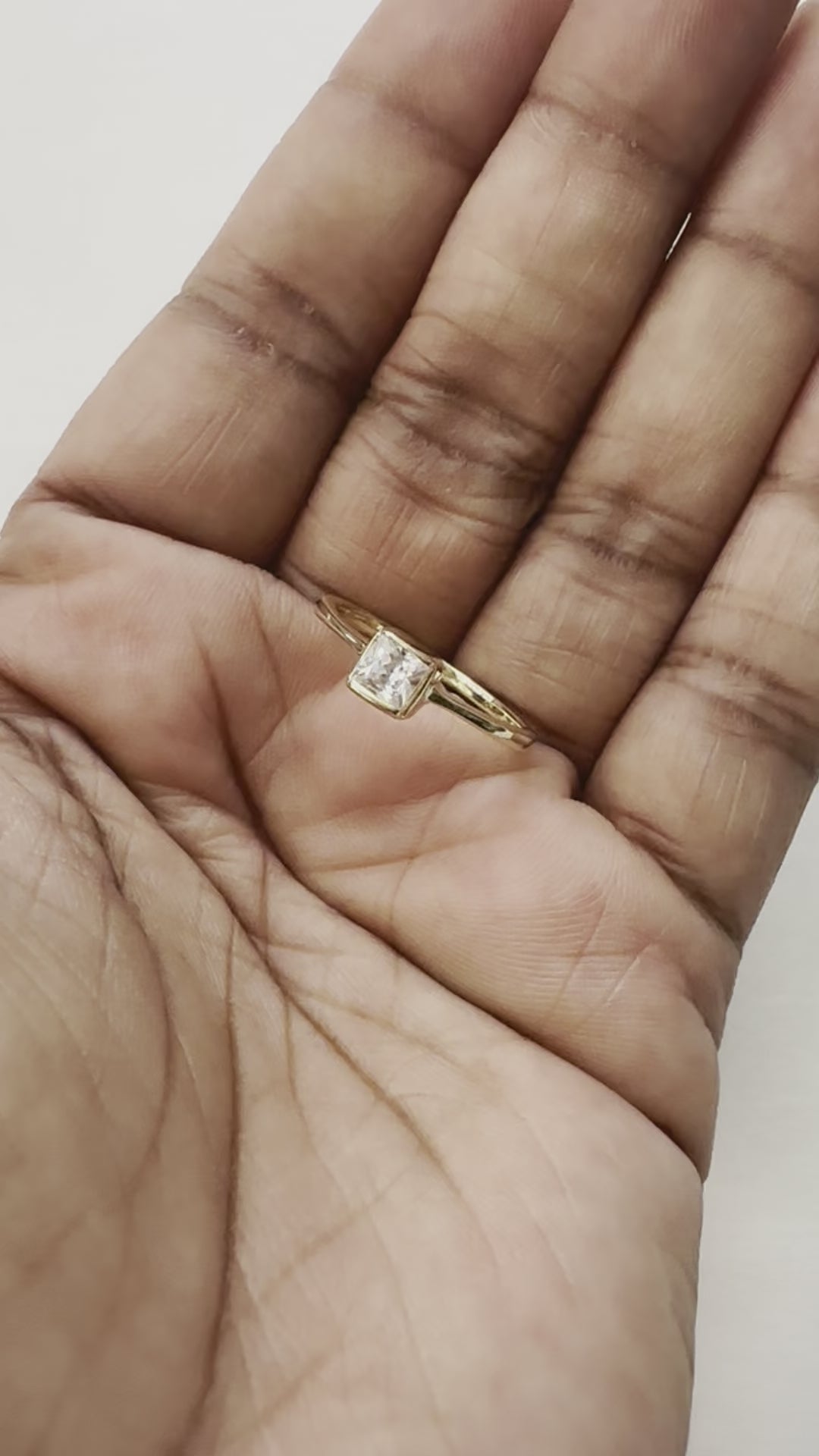 A real-time view of our Angel of Mine Ring shown on the palm of model’s hand.