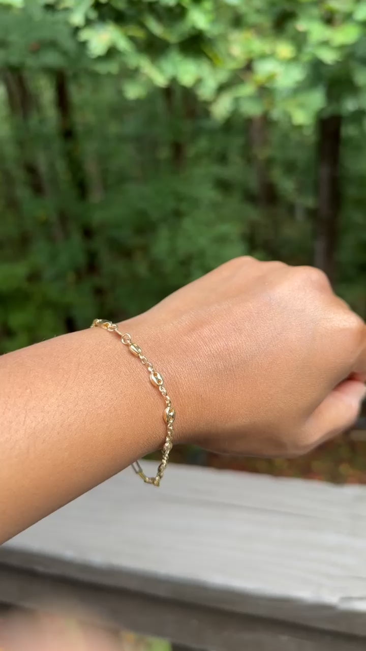 Glow Bracelet displayed on model's wrist.