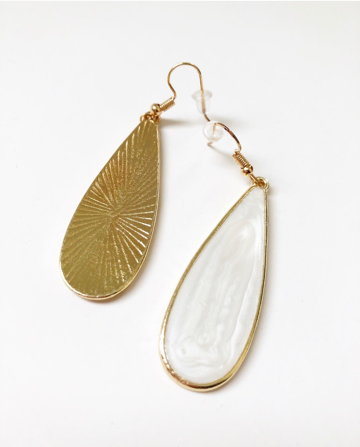 Front and back views of the White Candy Rain Drop Earrings.