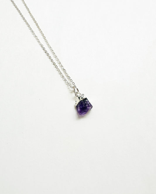 Photo of raw amethyst birthstone necklace.