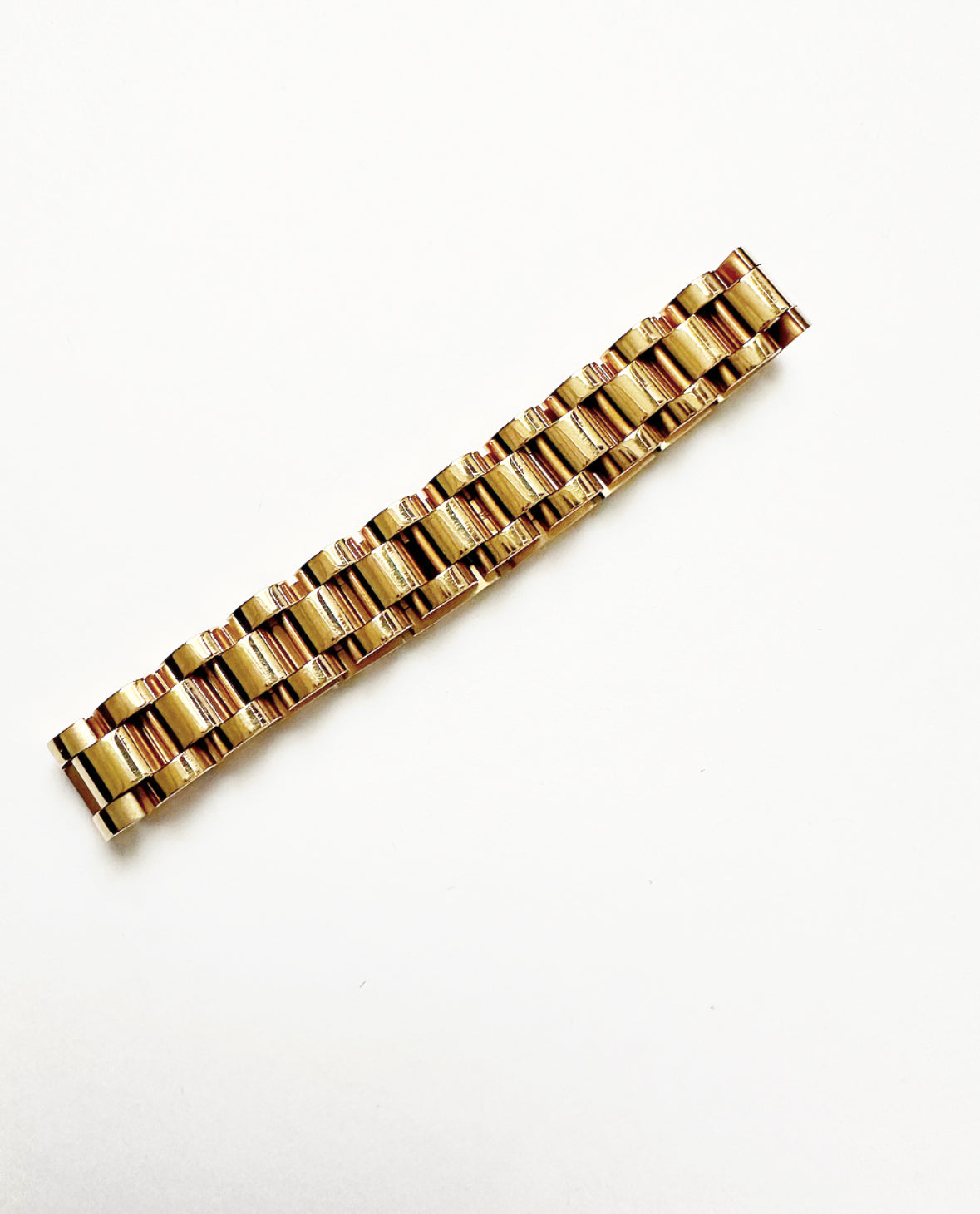 View of our gold B+B Bracelet featuring a rollie wristwatch design.