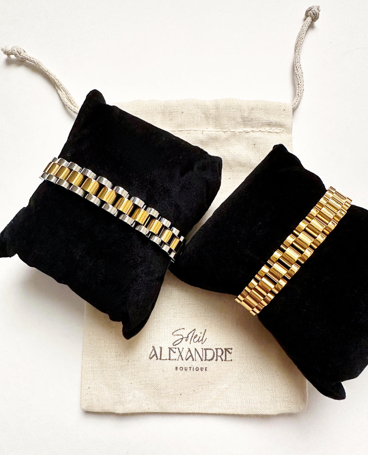 Our B+B Bracelets styled on our drawstring jewelry bag with logo.