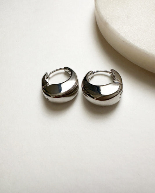 Our silver dome-shaped Luna Dome Mini Hoops.