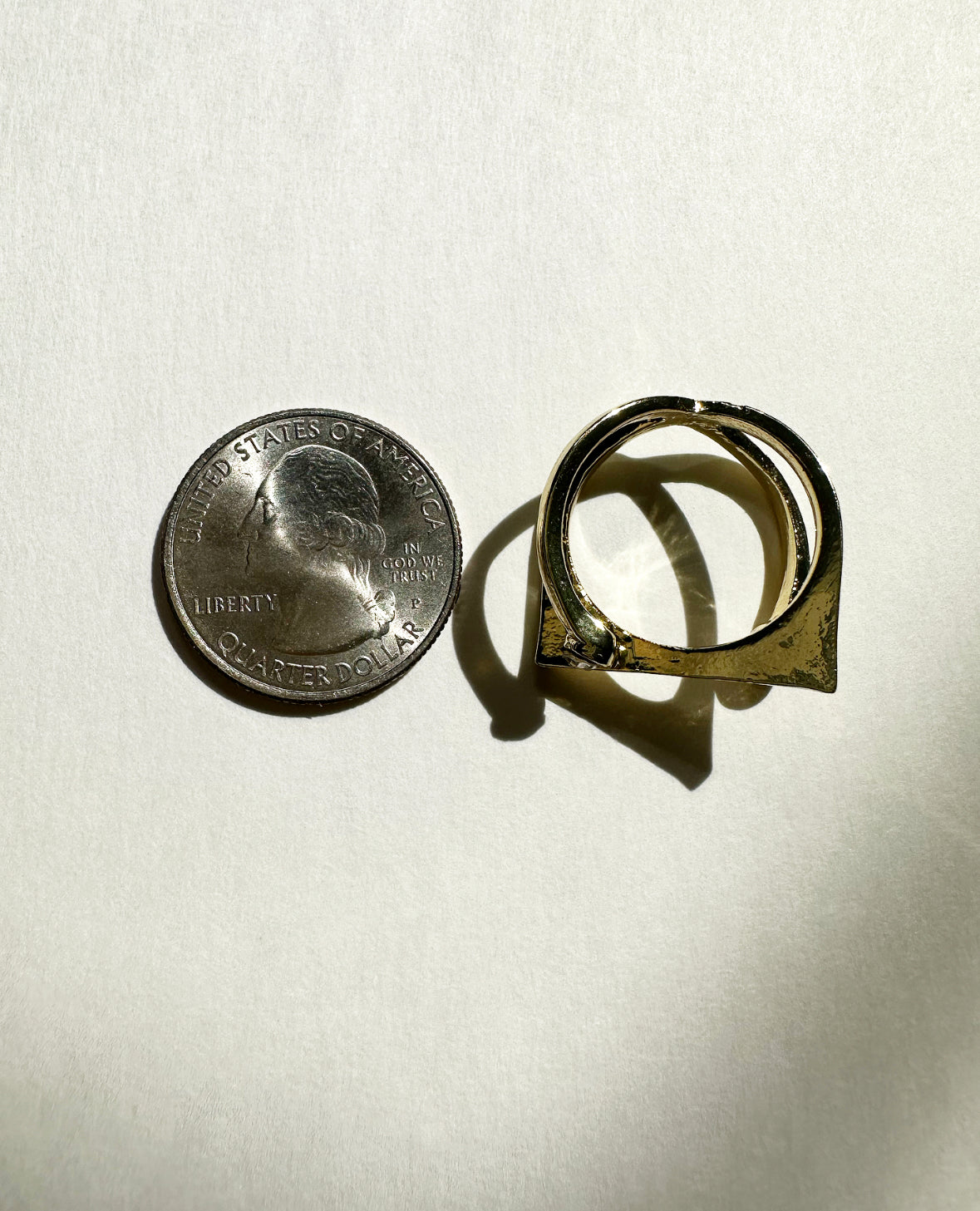 So Maude Ring next to a quarter for size comparison.