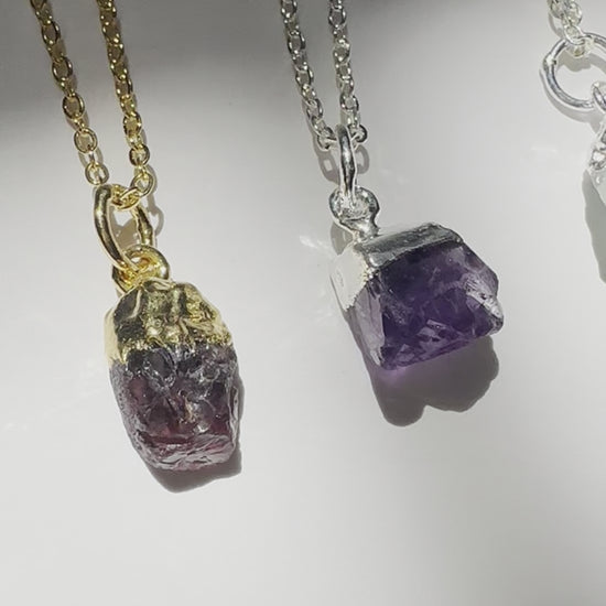 A real-time view of all twelve raw gemstone birthstone necklaces.