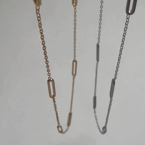 A real-time view of our gold and silver Paloma Necklaces.