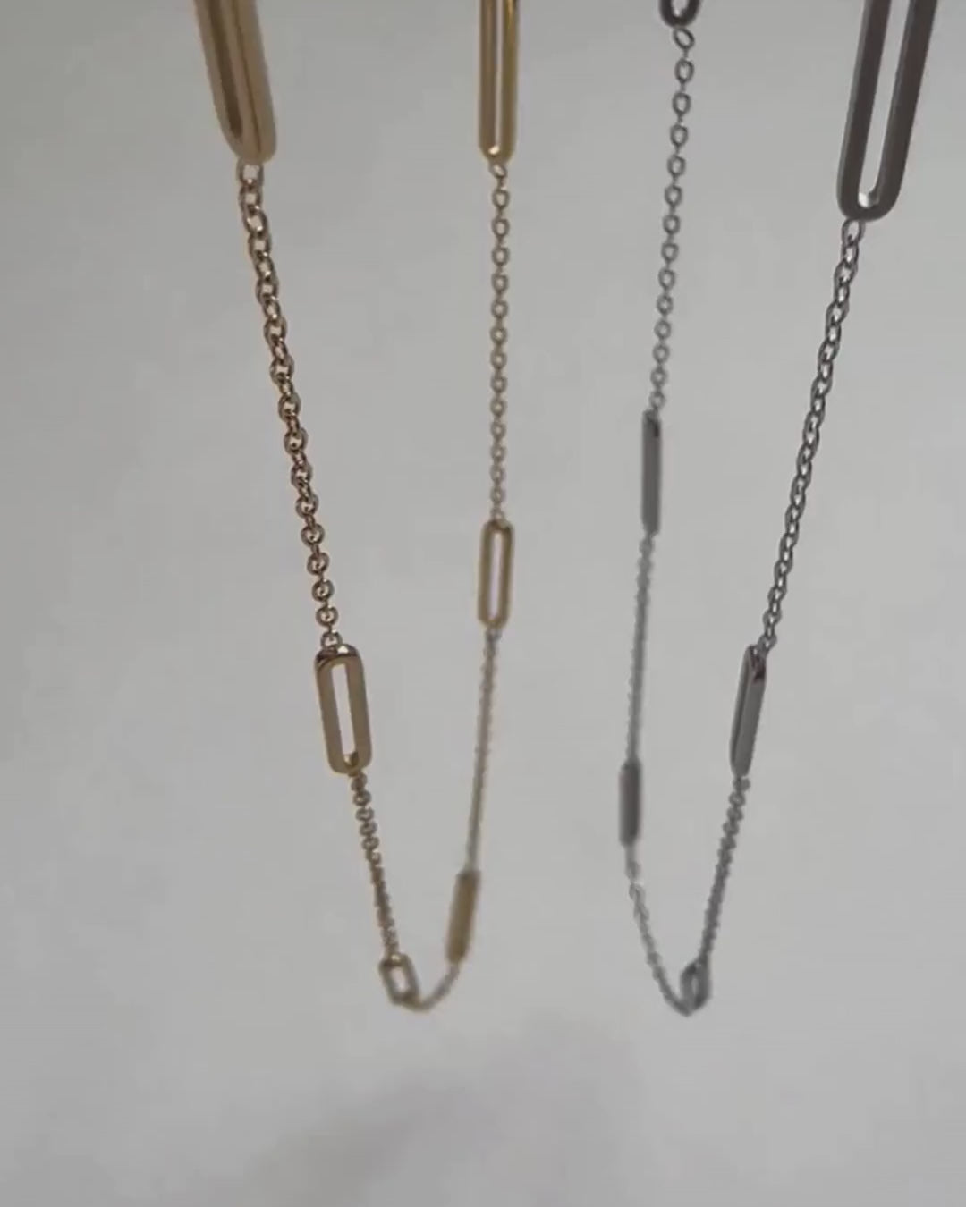 A real-time view of our gold and silver Paloma Necklaces.