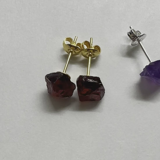 A real-time video showing all of the raw gemstone birthstone stud earrings.