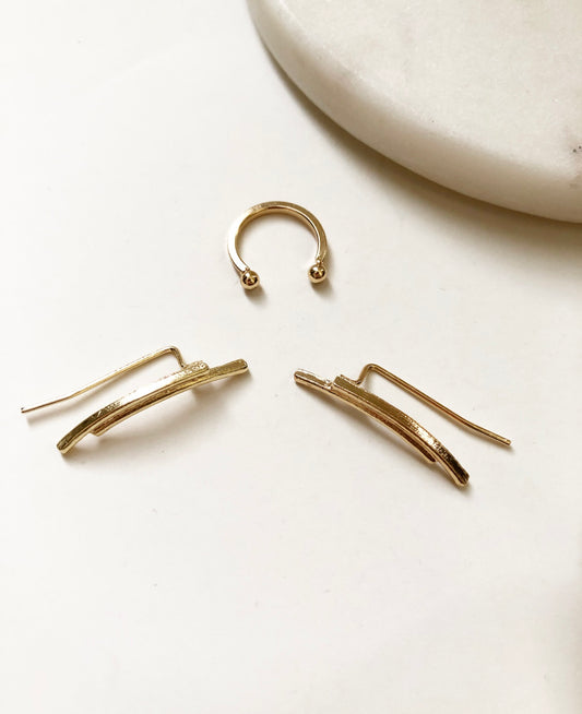 Gold 3-piece curved ear climbers and single cuff.
