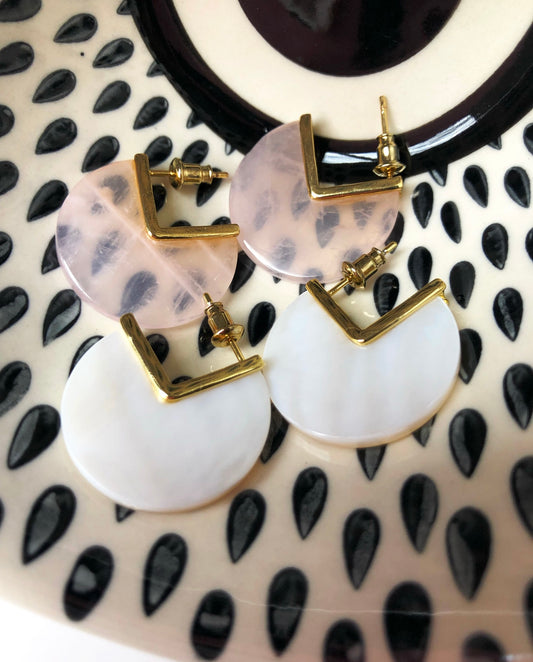 Close-up view of Adore You Earrings showing the transparency of the Rose Quartz variation and the opaqueness of the Mother-of-Pearl variation.